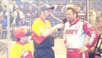  Tony Elliott put an exclamation point on a magical 1998 season campaign by capturing the inaugural 100 lap "Rumble in the Expo" at the Ft. Wayne Exposition Center. Piloting Mack McClellan's Sleep Tight Matress Company/Miller Brothers Excavating Hawk/Autocraft, Elliott took the lead from J.D. Turner on lap 77 and sailed forth to his third NAMARS Auto Value midget win of 1998.