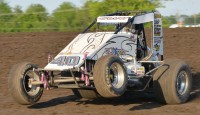 California driver Justin Grant survived a crazy 30-lap Main Event on Saturday to pick up his first-career USAC AMSOIL National Sprint Car win