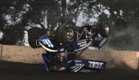 Black thunderclouds surrounded the Martin County Fairgrounds while streaks of lightning raced across the half mile of black gumbo as Championship Sprint Car Racing returned to the Fairmont Raceway in Fairmont , Minnesota , for the first time in over a decade. 