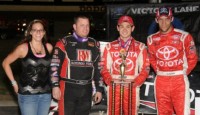 Larson is Top USAC Midget Gun on Dodge City Night One! Kyle Larson emerged from a heated early-race battle and then survived a late charge teammate Bryan Clauson and then Brad Kuhn to win Friday night’s 30-lap USAC Mopar National Midget feature event atop the 3/8-mile Dodge City Raceway Park clay oval.