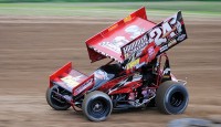Dinan escapes with 305 victory...