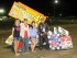 Dylan Westbrook poses in victory lane with representatives from night sponsor Rapid Rad. (Rod Henderson photo).