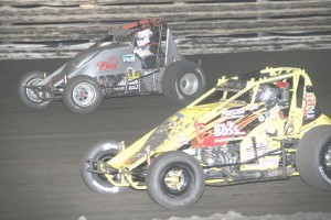 #50 Travis Rilat and #21 Hud Cone battle during usac non wing action. - Action Photo