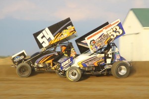 #53 Phil Gressman goes wheel to wheel with #54 Cap Henry during Ohio Sprint Speedweek at Attica Raceway Park. - Action Photo