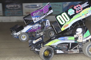 Alvin Roepke (#00) racing with Jess Stiger (#8) at Fremont Speedway. - Action Photo