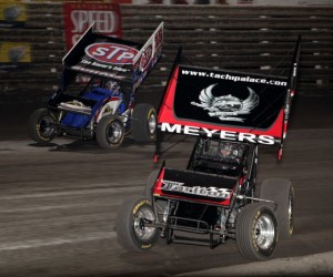 Donny Schatz (15) and Jason Meyers (21m) battle for 2nd during the National Speed Sport News World Challenge at Knoxville Raceway in Knoxville, Iowa on August 10, 2012.  Schatz would win while Meyer would finish 3rd to Sammy Swindell.  - Mermaid Racing Photos / Serena Dalhamer