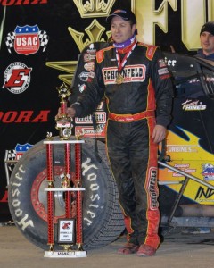 Tracy Hines in victory lane at the 4-Crown Nationals.   - Bill Miller Photo