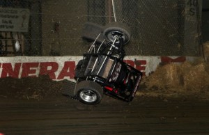 Trey Starks hits the hay bales during practice sessions at the 2013 Chili Bowl Midget Nationals in Tulsa, Oklahoma on January 7, 2013.  (Serena Dalhamer photo)