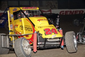 Tracy Hines jumps the berm during the 1st B feature of the 2013