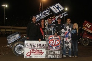 Tim Kaeding with his crew in victory lane after winning Saturday night's World of Outlaws feature at Tri-State Speedway. - James McDonald / Apexonephoto