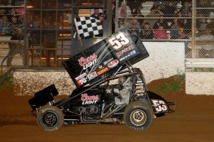 Andy Gregg taking the checkered flag at Placerville Speedway. - image courtesy of Placerville Speedway