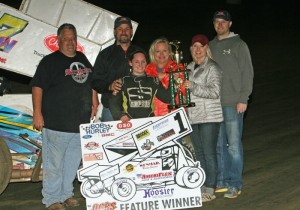 Harli White with his family and crew in victory lane after his second OCRS feature win in a row. - Mike Howard Photo