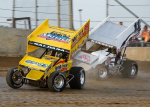 Joey Saldana (#71m) racing with Kraig Kinser (11K). - Mike Campbell Photo