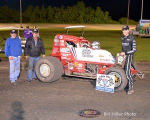 Chad Boespflug and crew in Victory Lane after winning the 25 lap sprint car feature event at the Gas City I-69 Speedway on Friday night May 24, 2013. - Bill Miller Photo