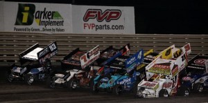 Appropriately, FVP Racing sponsored Brian Brown (21) earns the right to lead the four-abreast salute to the fans prior to the World of Outlaws Sprint feature at Knoxville Raceway on 11 May 2013. - Serena Dalhamer photo