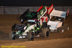 Chuck Bellefeuille (25), Rafe Essary (26) and Alex DeCamp (84) fight for position Mike Spivey Photo