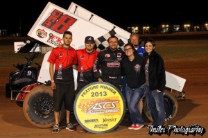 Tony Bruce, Jr. stands with his crew following his victory at the Lawton Speedway with the American Bank of Oklahoma Sooner Region. (ASCS / Thriller Photo). 