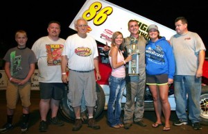 Kyle Bellm of Nixa celebrates his 360 winged sprint victory at Double-X Speedway in California MO. June 23, 2013 www.xxspeedway.com