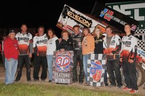 Craig Dollansky with crew members in victory lane. - Photo courtesy of Rob Kocak