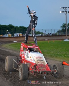 Chad Boespflug salutes the crowd after winning the sprint car feature event at the Gas City I-69 Speedway. - Bill Miller Photo