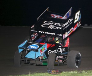 Donny Schatz (15) powers by Daryn Pittman (9) to take the lead at Jackson Speedway. (Serena Dalhamer photo)
