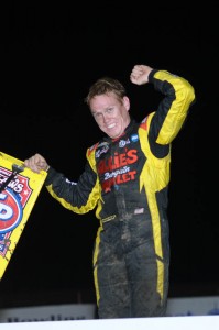 Brad Sweet celebrates his feature victory after Sunday night's Ohio Sprint Speedweek program at Waynesfield Raceway Park. - Jan Dunlap Photo