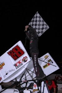 Tony Bruce, Jr. celebrates his first victory on 2013 at the Electric City Speedway in Great Falls, Mont. (ASCS / Bryan Hulbert)