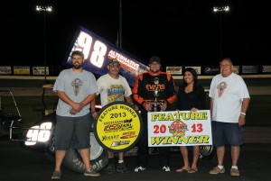 J.D. Johnson and crew in victory lane after winning the URSS feature at Dodge City Raceway Park. - TWC Photo