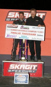 Shane Stewart in victory lane with track owner Steve Beitler after winning the Bob's Burgers and Brews Summer Nationals at Skagit Speedway. - Robert G. Hunter Photo