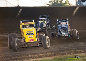 Tracy Hines, Scotty Weir, and Braylon Fitzpatrick racing at Kokomo. - Mike Campbell Photo