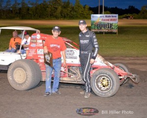 Car owner Paul Hazen and driver Chad Boespflug in Victory Lane after Chad won the 25 lap sprint car event at the Gas City I-69 Speedway on Friday night August 2, 2013. - Bill Miller Photo