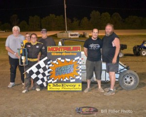 Lynsey Liguori celebrate with family and crew in Victory Lane after winning the midget event at the Montpelier Motor Speedway on Saturday August 17, 2013. - Bill Miller Photo