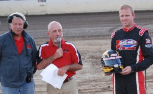 “Brady Short Receives 2013 KISS Champion's Helmet, presided by Tri-State Speedway promoter Tom Helfrich. - Doug Vandeventer Photo