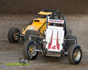 Close racing during BOSS competition at Eldora Speedway. - Mike Campbell Photo