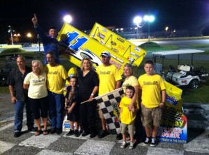 Joey Aguilar pictured here with the Riddle family after winning the Frank Riddle Memorial on Saturday at Citrus County Speedway. - TBARA Photo