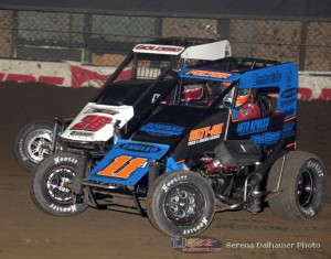 Andrew Felker (#11) inside of Shane Gobolic (#26) at the Chili Bowl Nationals. - Serena Dalhamer Photo