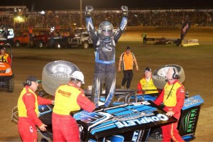 Tim Kaeding celebrating after flipping his car during the post race celebration at the Grand Annual Sprintcar Classic. - Image courtesy of Premier Speedway