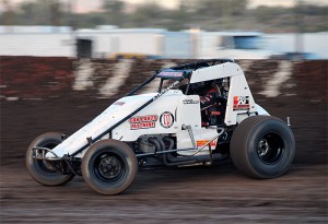 Aaron Reutzel drove Bob and Christie Miller's No. 21a past 32 cars in three USAC Southwest vs. USAC West Coast Sprint Car features at Canyon Speedway Park's Winter Challenge over the weekend.  (Lonnie Wheatley photo)