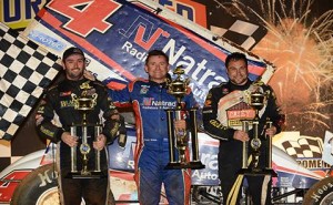 Trevor Green (center) in victory lane with Kraig Kinser (right) and Ben Atkinson on the podium at Syndey Speedway. - Image courtesy of Sydney Speedway