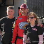 Dave Darland poses with his car owners. - Bill Miller Photo