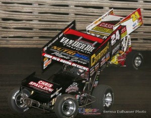 Terry McCarl (24) slides under Brian Brown (21) - Serena Dalhamer photo