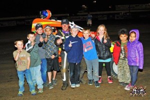 Christopher Parkinson and crew after winning the Wingless Auto Racing feature at Humboldt Speedway.  - John Lee www.highfly-nphotos.com