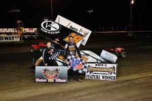 Ian Madsen picked up his third career MOWA series win with a victory, Friday, at Lincoln Speedway, Lincoln, Ill. Steven Hughes, Jr. Fan Club winner, was in victory lane to celebrate with Madsen. - Bill Baker Photo