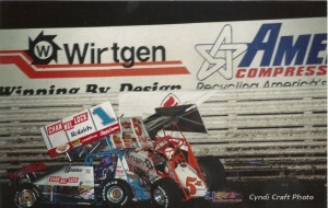 Mark Kinser and Sammy Swindell's 1997 Knoxville Nationals coming to an end.  - Cyndi Craft Photo
