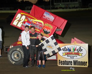 Randy Hannagan with his family in victory lane Friday night at Limaland Motorsports Park. - Mike Campbell Photo