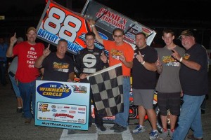 Jimmy McCune and crew celebrate their Must See Racing Xtreme Sprint Series win Saturday night at Kalamazoo Speedway. R & S Racing Photo