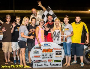 Alex DeCamp enjoys victory lane with crew and friends. -  Mike Spivey Photo. 