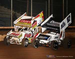 Brian Brown (21) passes Aaron Reutzel (87) coming out of turn 4 to take the checkered flag (Serena Dalhamer photo)