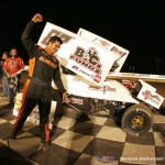 Aaron Reutzel exits his car after winning the finale of the Winter Heat Sprint Car Showdown on Saturday night at Cocopah Speedway. - Serena Dalhamer Photo