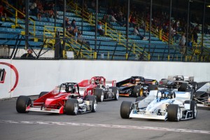 Randy Ritskes (37) and Michael Muldoon (51) lead a Novelis Supermodified heat race to green during last year's Spring Championship at Oswego Speedway. (Bill Taylor)